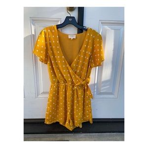 Yellow polka-dot romper